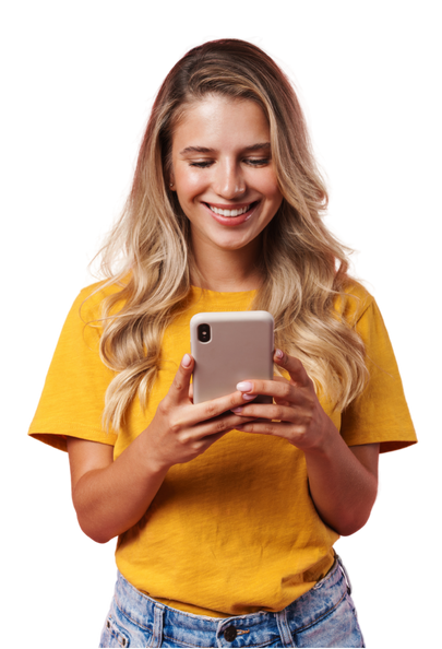 women smiling and starring at her phone 